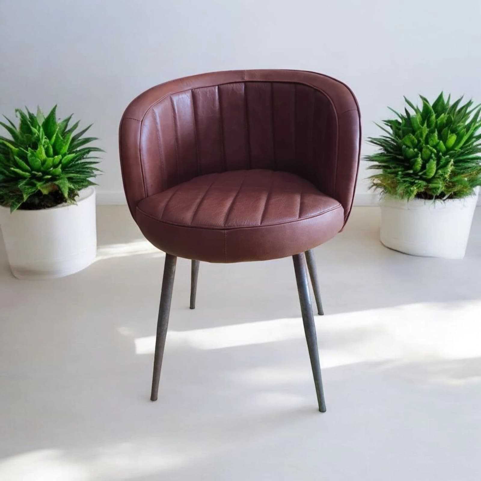 NIRVATATVA Barrel Back Leatherette Chair